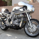 Illustration for article titled A Wonderful Crazy Genius Crammed A Ferrari V8 Into A Custom Motorcycle